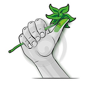 Hand with a green thumb