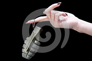 Hand grenade in girl hand