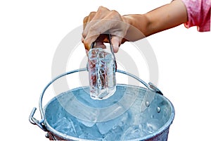 Hand grip the ice from the ice bucket isolate white background w