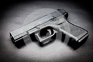 Hand gun on black background