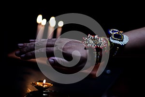 hand of a guy with rakhi tied in wrist in the occasion of rakshabandhan