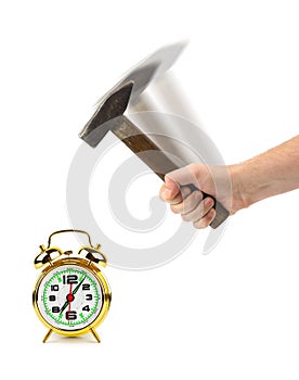 Hand with hammer and alarm clock