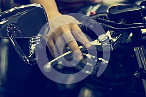 Hand on handlebars motorcycle
