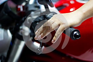 Hand on handlebars motorcycle