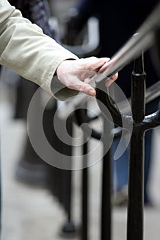 Hand on a handrail