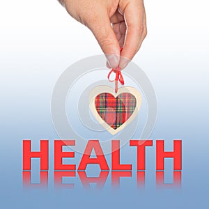 Hand with heart and word health