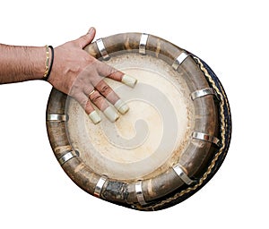 Hand hitting Indian drum