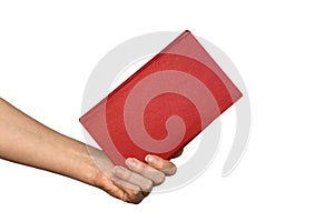 Hand hold blank red hardcover book on white background.