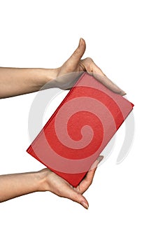 Hand hold blank red hardcover book on white background.