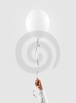 Hand hold blank white balloon mock up . Baloon mockup.