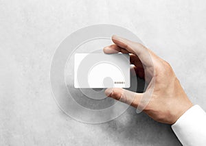 Hand hold blank white loyalty card mockup with rounded corners