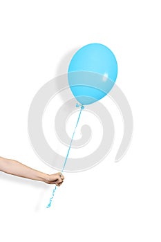 Hand hold blue balloon. Party or present concept. Blue Balloon and hand isolated on white background