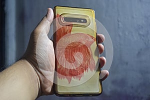 Hand hold a case phone