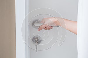 Hand hold door knob for open the door or close the door concept