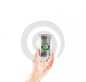 Hand hold a grey aluminum food container with green recycle symbol on white background