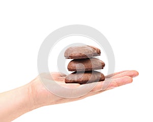 Hand hold Kisses Cookies with chocolate.