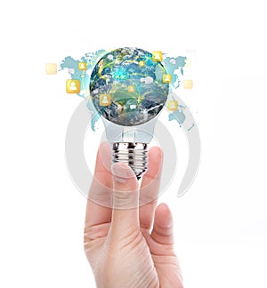 Hand hold Light Bulb with earth of social network