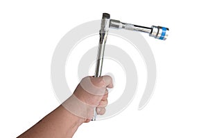 Hand hold a Mechanic tool,Socket wrench with a metal block on white