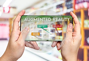 Hand hold mobile phone and using augmented reality AR app fo