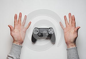 Hand hold new joystick isolated. Gamer play game with gamepad controller. Gaming man holding simulator joypad. Person with keypad