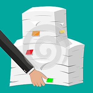 Hand with pile of papers. Office documents heap.