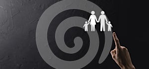 Hand hold young family icon. Family life insurance,supporting and services,family policy and supporting families concepts.Happy