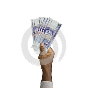 Hand holding 3D rendered 1000 Cambodian riel notes isolated on white background