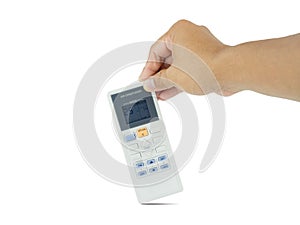 Hand holding air conditioner remote control on white background.