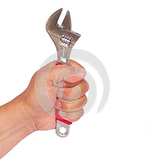 Hand holding ajustable wrench