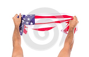 Hand holding American flag isolated