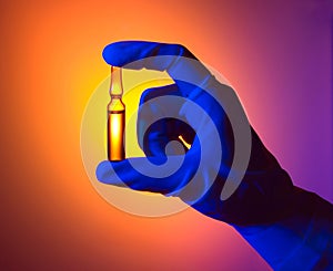Hand Holding Ampule