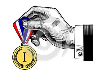 Hand holding an award medal with blue white red ribbon