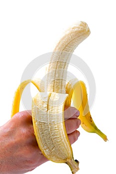 Hand holding a banana