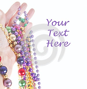 Hand holding beads