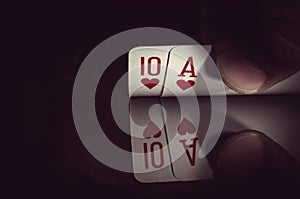 hand holding best classic winning blackjack combination ten and ace