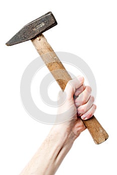 Hand holding a big hammer