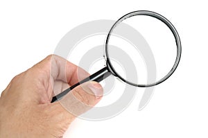 A hand holding a black frame magnifying glass