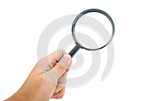 Hand holding black magnifier glass