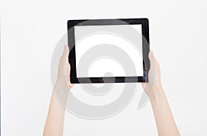 Hand holding black tablet isolated on white clipping path inside. Top view.Mock up.Copy space.Template.Blank.