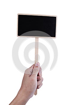 hand holding a blank blackboard label isolated on a white background