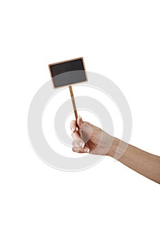 hand holding a blank blackboard label