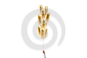 Hand holding blank gold cylindrical balloon stack mockup, isolated