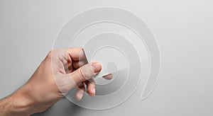 A hand is holding a blank