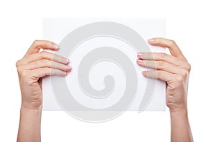 Hand holding blank paper isolated