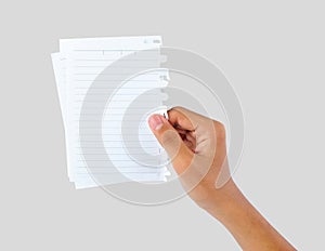 Hand holding blank papers