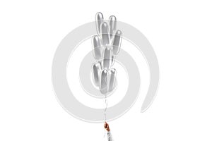 Hand holding blank silver cylindrical balloon stack mockup, isolated