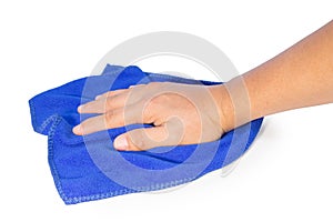 Hand holding a blue cleaning rag isolated on white
