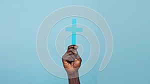 A Hand Holding a Blue Cross.AI generated image