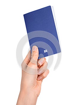 Hand holding blue passport isolated on white background. Documents, visa, citizenship or emigration concept