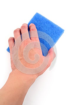 Hand holding blue scrubber